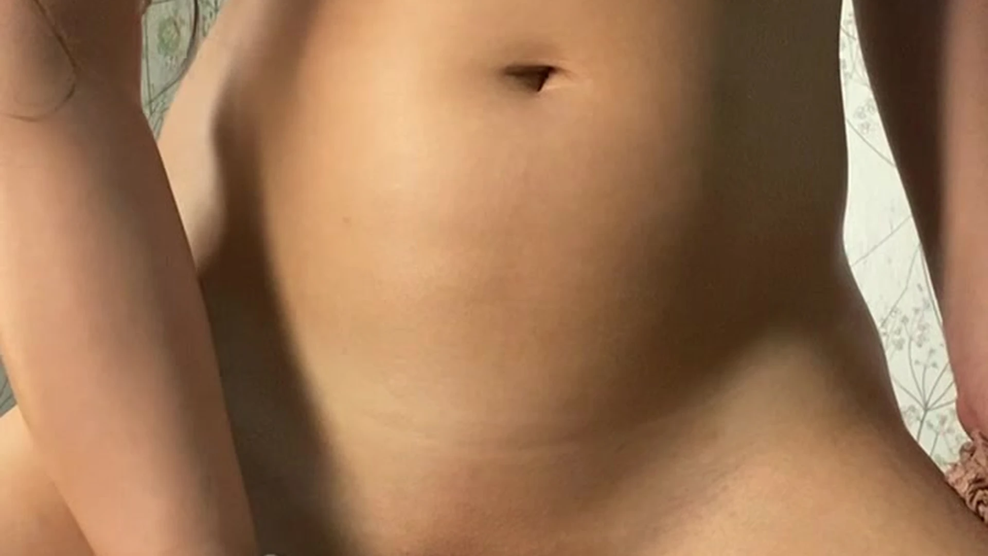 Alina Angel half naked and teasing with sex toy