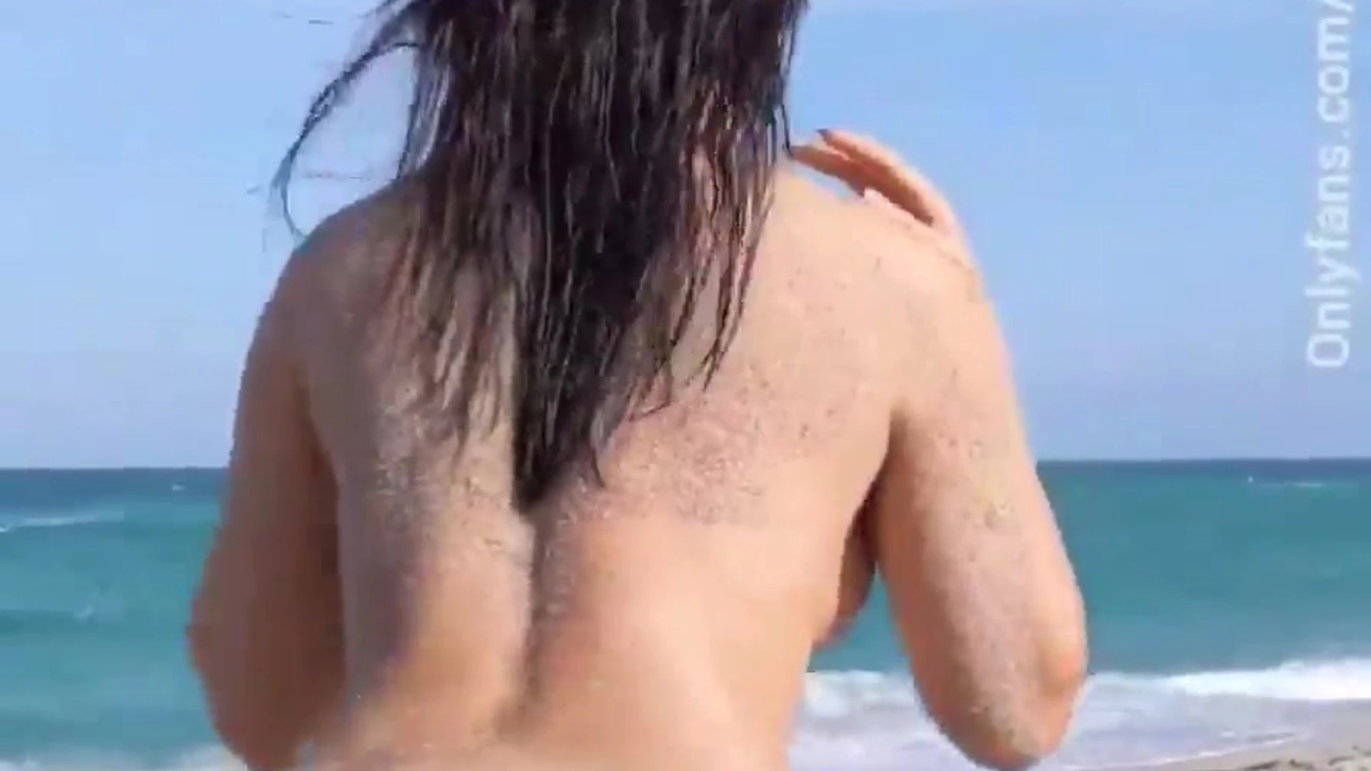 Alina Angel getting nude on a beach