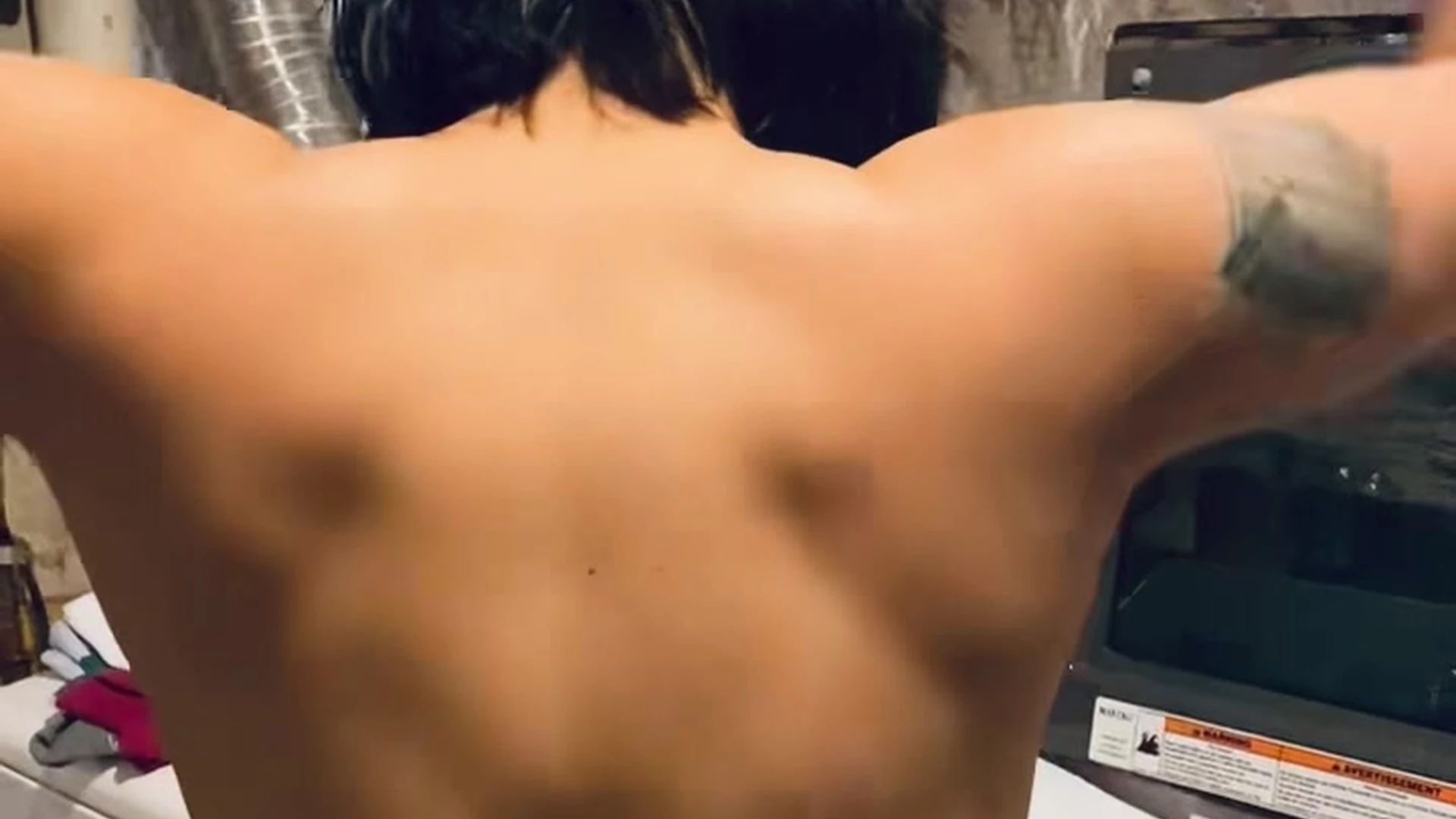 Womanwearingred showing her naked backside (Sexy)