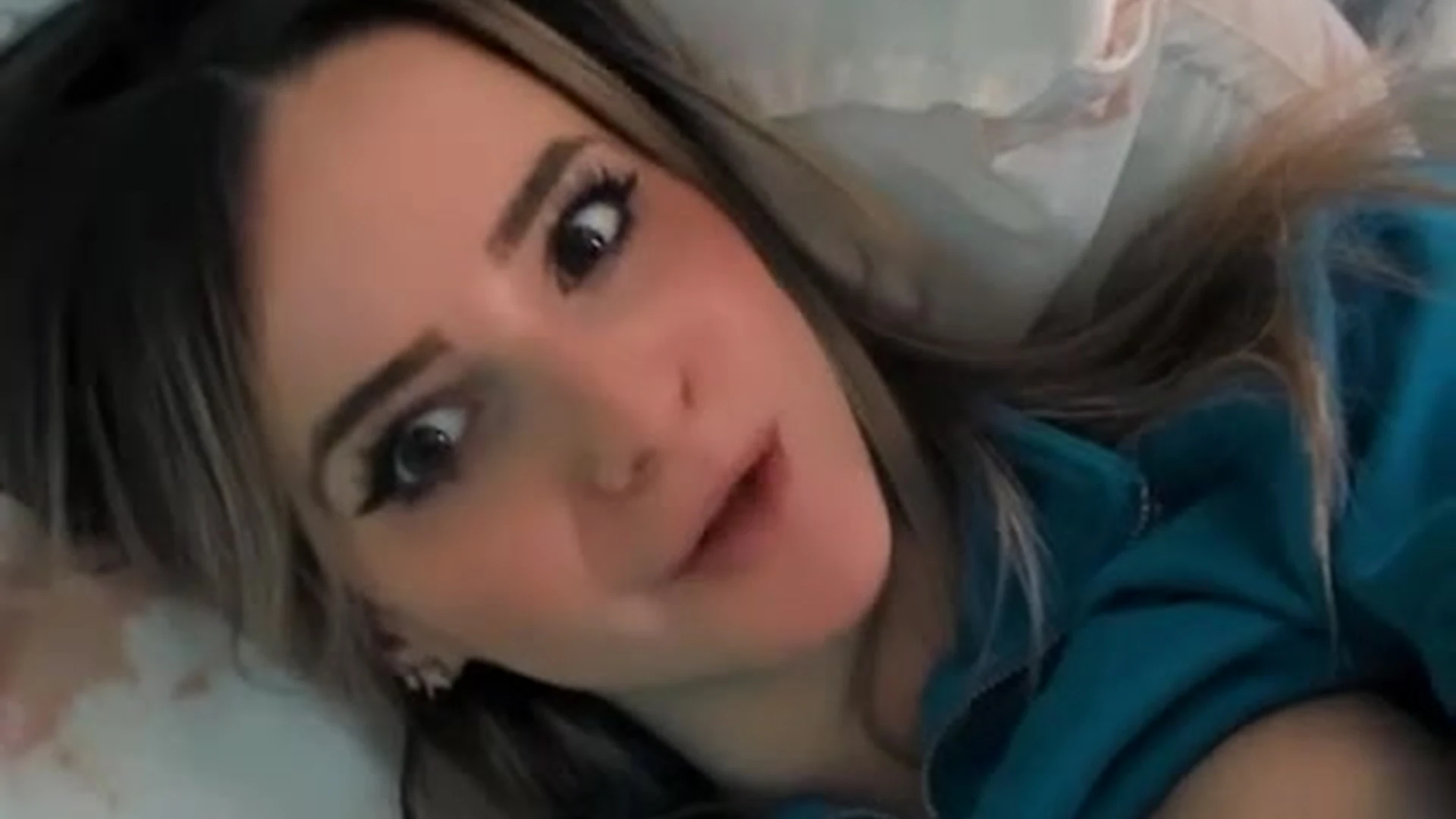 Kaitlyn Krems lift her t-shirt and showing boobs