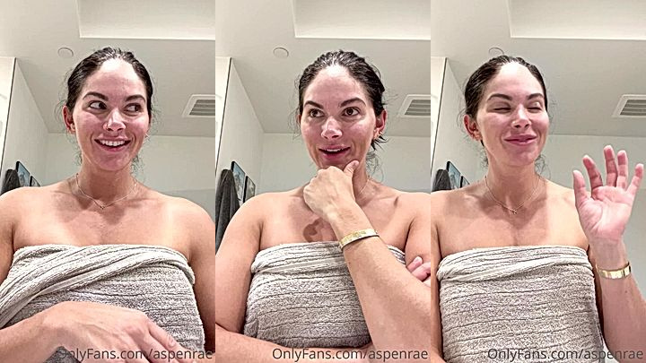 naughty onlyfans model Aspen Rae use a towel to cover her natural boobs