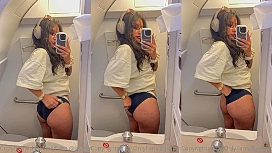 naughty nasty Jasminx slides her hands all over her smooth skin, carresses her juicy tits hard